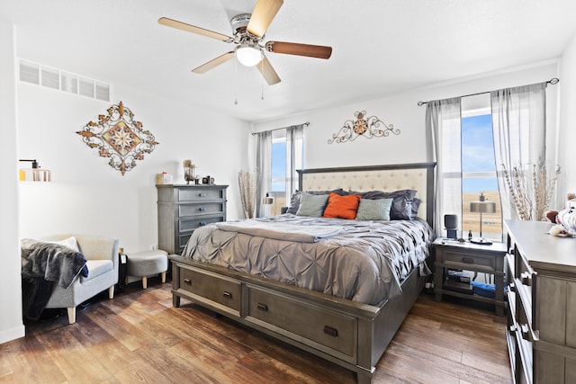 552 Other, Rapid City, SD 57703 - bedroom with visible vents, hardwood / wood-style flooring, and a ceiling fan