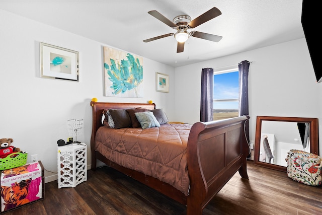 552 Other, Rapid City, SD 57703 - bedroom featuring dark wood-type flooring and ceiling fan