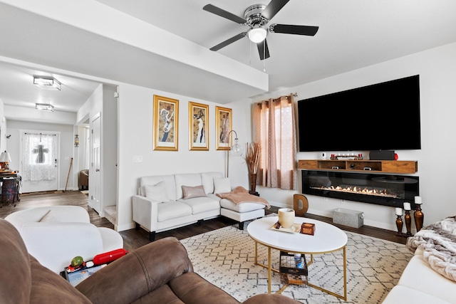 552 Other, Rapid City, SD 57703 - living room with baseboards, a ceiling fan, and wood finished floors