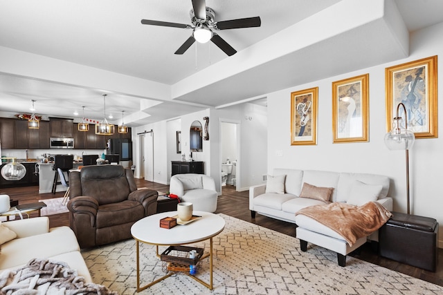 552 Other, Rapid City, SD 57703 - living area with ceiling fan, wood finished floors, and baseboards