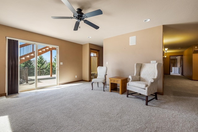 6627 Kennemer Dr, Rapid City, SD 57702 - sitting room featuring carpet flooring, visible vents, baseboards, and ceiling fan