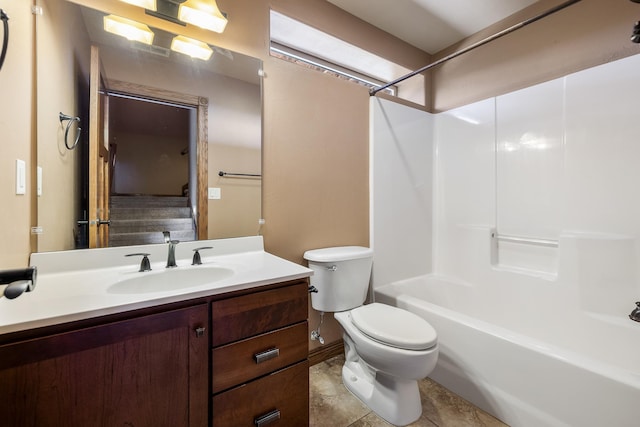 6627 Kennemer Dr, Rapid City, SD 57702 - bathroom featuring tile patterned floors, shower / bathtub combination, vanity, and toilet