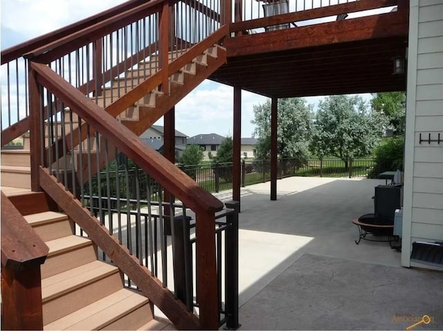 6627 Kennemer Dr, Rapid City, SD 57702 - view of patio with fence and stairway