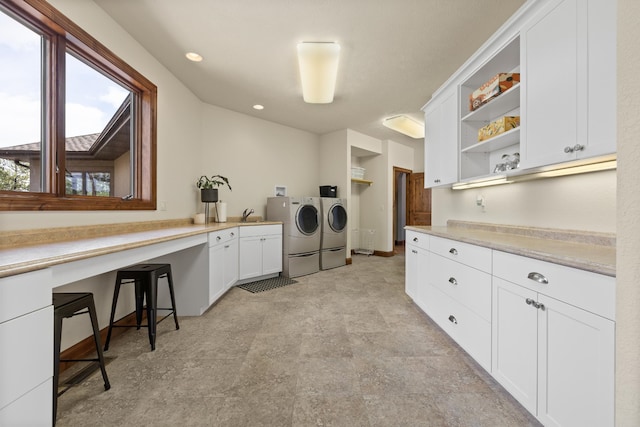 2724 Diamond Oak Pl, Rapid City, SD 57702 - washroom featuring recessed lighting, independent washer and dryer, light floors, and cabinet space