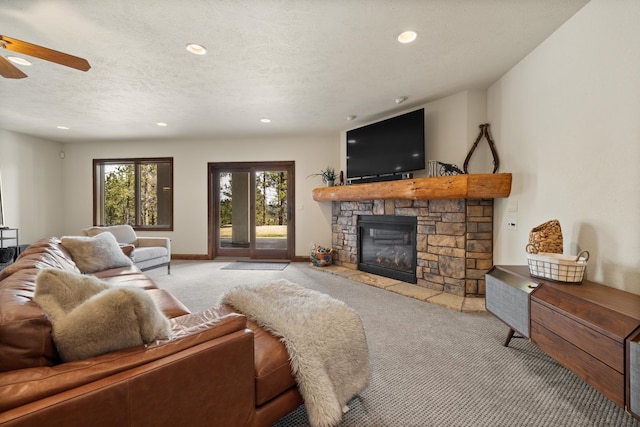 2724 Diamond Oak Pl, Rapid City, SD 57702 - carpeted living area featuring baseboards, a ceiling fan, recessed lighting, and a fireplace