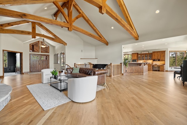 2724 Diamond Oak Pl, Rapid City, SD 57702 - living area featuring high vaulted ceiling, recessed lighting, light wood-type flooring, and beam ceiling