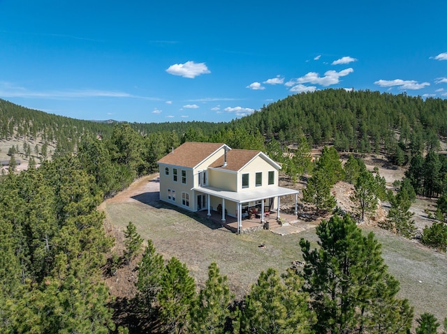 11583 Pay Dirt Pass, Custer, SD 57730 - birds eye view of property with a forest view