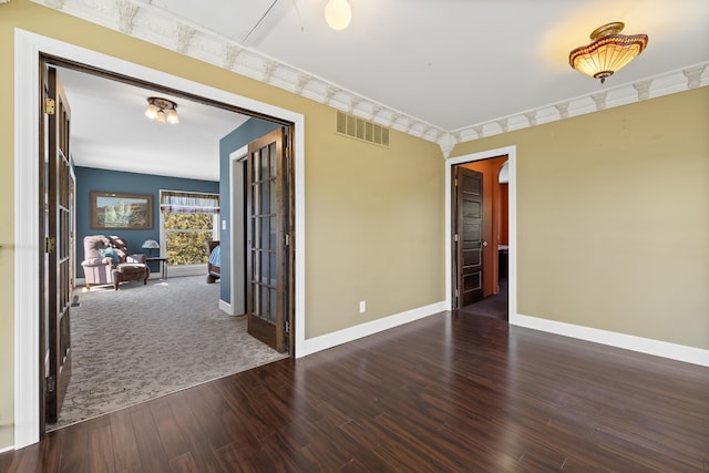11583 Pay Dirt Pass, Custer, SD 57730 - unfurnished room with wood finished floors, visible vents, and baseboards