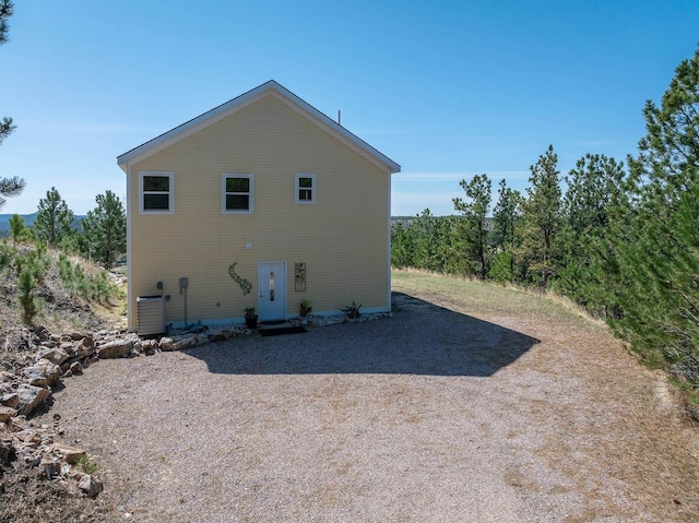 11583 Pay Dirt Pass, Custer, SD 57730 - rear view of house featuring cooling unit