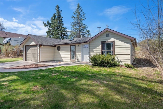ranch-style house with concrete driveway, a front lawn, and an attached garage