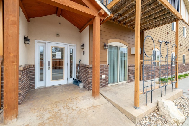 1632 Evergreen Dr, Rapid City, SD 57702 - entrance to property featuring brick siding and a patio