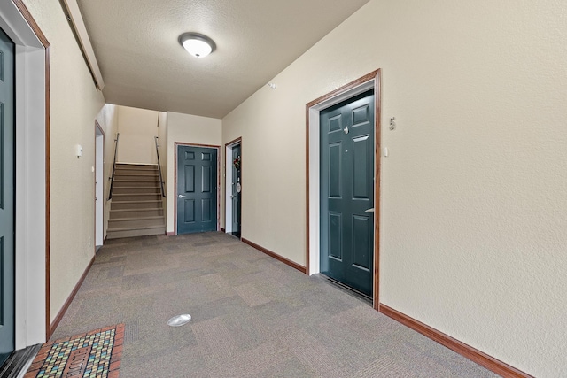 1632 Evergreen Dr, Rapid City, SD 57702 - interior space with stairway, baseboards, a textured ceiling, and carpet