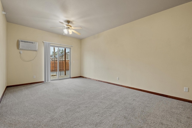 1632 Evergreen Dr, Rapid City, SD 57702 - empty room featuring ceiling fan, baseboards, carpet flooring, and a wall unit AC