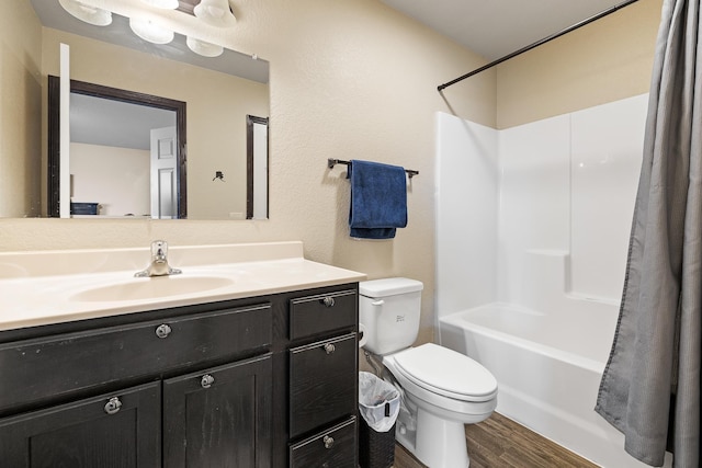 2207 Other, Rapid City, SD 57703 - full bath featuring shower / bath combo, wood finished floors, vanity, and toilet