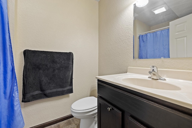 2207 Other, Rapid City, SD 57703 - full bath with toilet, a textured wall, and vanity