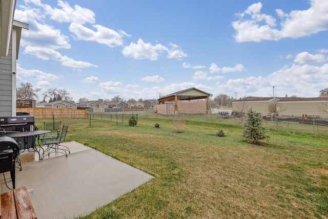 2207 Other, Rapid City, SD 57703 - view of yard featuring a fenced backyard, a residential view, a patio area, and outdoor dining area