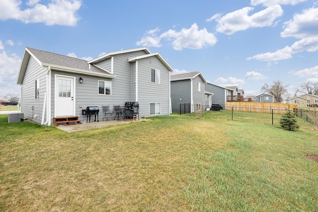 2207 Other, Rapid City, SD 57703 - back of house featuring a yard, a patio area, and fence