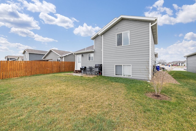 2207 Other, Rapid City, SD 57703 - back of property with a lawn, a patio, and fence