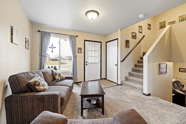 2207 Other, Rapid City, SD 57703 - living area featuring light colored carpet, baseboards, stairs, and a textured ceiling