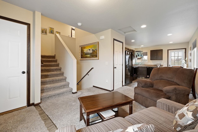 2207 Other, Rapid City, SD 57703 - living area featuring stairs, attic access, light wood finished floors, baseboards, and recessed lighting