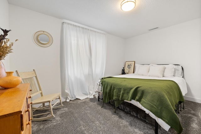 3818 W Main St, Rapid City, SD 57702 - bedroom featuring carpet floors, visible vents, and baseboards