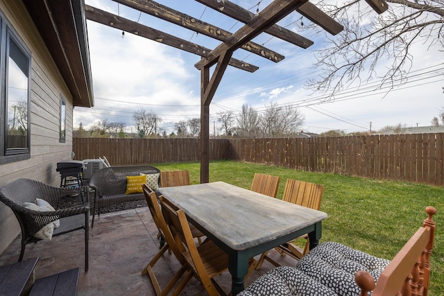 3818 W Main St, Rapid City, SD 57702 - view of patio / terrace with a pergola, outdoor dining area, and a fenced backyard