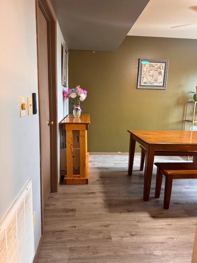 16A Statesboro Dr, Belle Fourche, SD 57717 - hallway featuring wood finished floors and baseboards