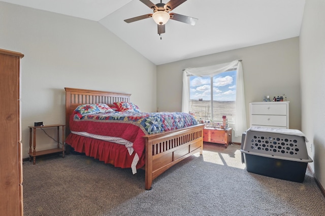 carpeted bedroom featuring vaulted ceiling and a ceiling fan
