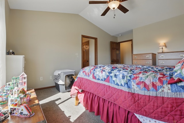 carpeted bedroom featuring lofted ceiling, a ceiling fan, and baseboards