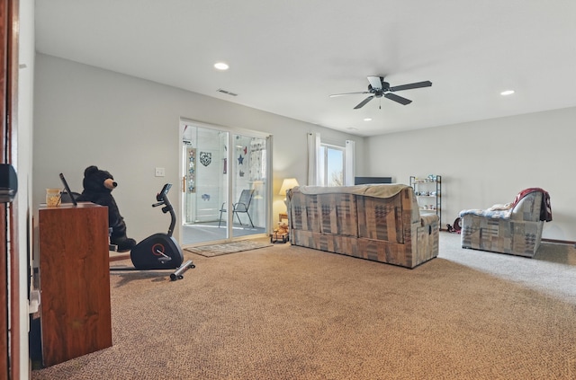 carpeted bedroom featuring a ceiling fan, recessed lighting, and access to exterior