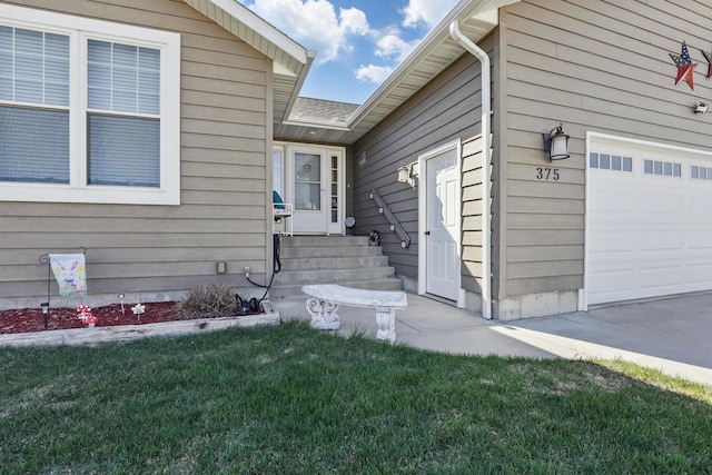property entrance featuring a yard and a shingled roof