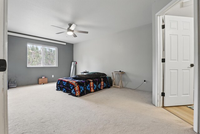 12634 Robins Roost Rd, Hill City, SD 57745 - carpeted bedroom with a ceiling fan
