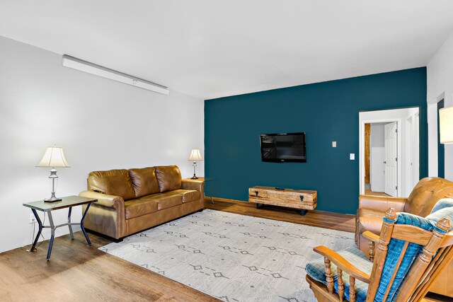 12634 Robins Roost Rd, Hill City, SD 57745 - living area featuring wood finished floors