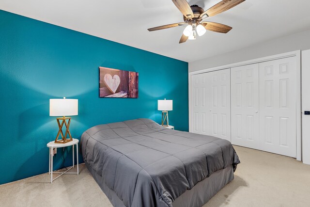 12634 Robins Roost Rd, Hill City, SD 57745 - carpeted bedroom with ceiling fan and a closet