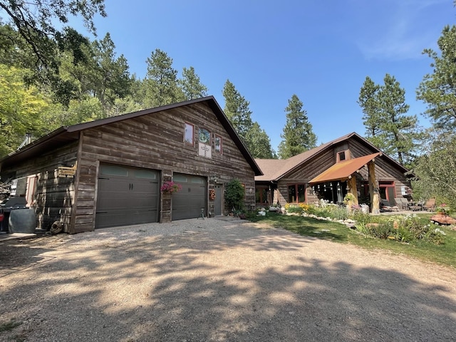 20097 Higgins Gulch Rd, Spearfish, SD 57783 - view of front of property featuring a garage and driveway