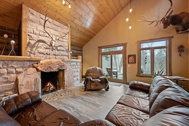 20097 Higgins Gulch Rd, Spearfish, SD 57783 - living area featuring a fireplace, high vaulted ceiling, wood ceiling, and wood finished floors