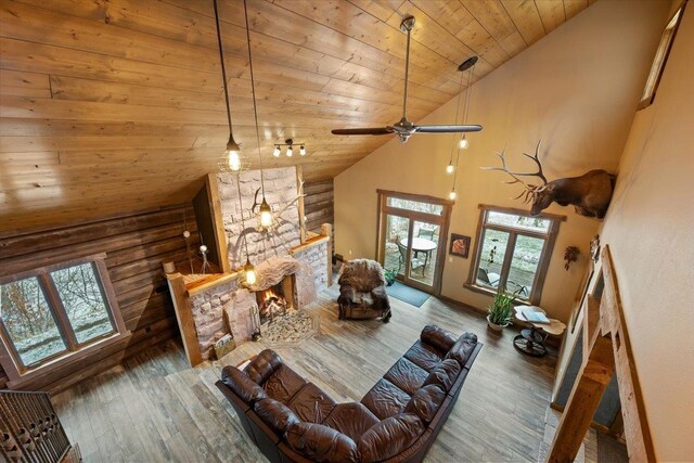20097 Higgins Gulch Rd, Spearfish, SD 57783 - living area featuring wood ceiling, a ceiling fan, high vaulted ceiling, and wood finished floors