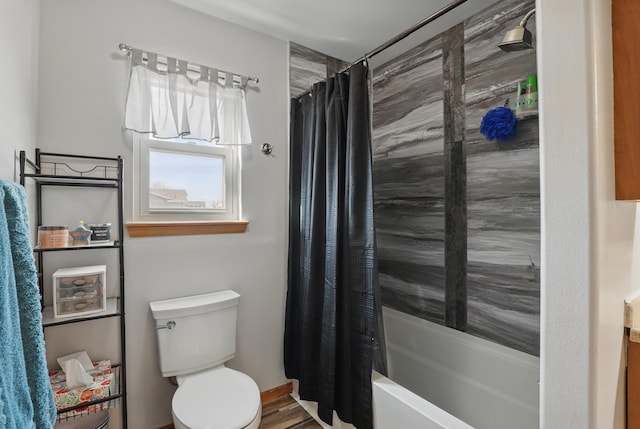 bathroom with wood finished floors, toilet, and shower / bath combination with curtain