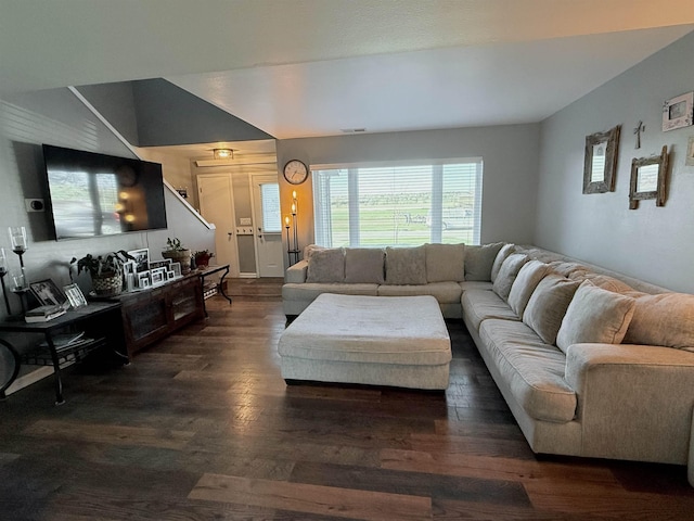 living room with dark wood finished floors and visible vents