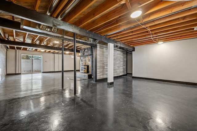 basement featuring baseboards