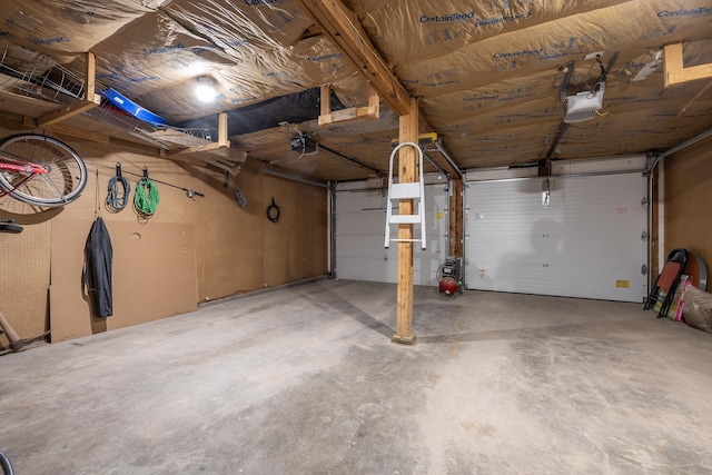 garage featuring a garage door opener
