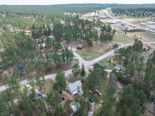 bird's eye view featuring a view of trees
