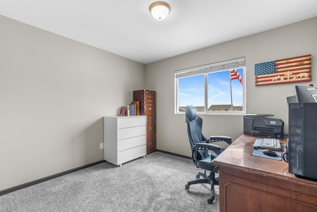 carpeted office with baseboards