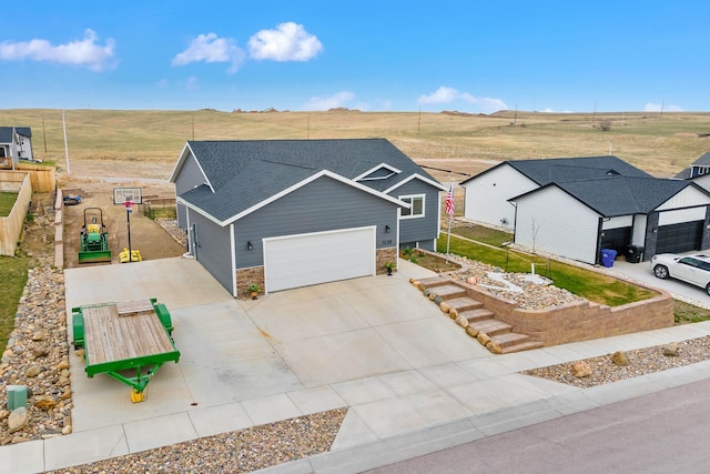 birds eye view of property featuring a rural view
