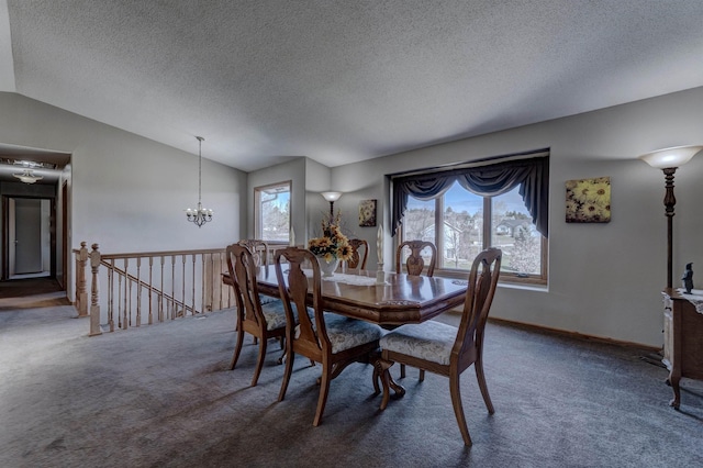 5341 Scrub Oak Cir, Rapid City, SD 57702 - carpeted dining room with vaulted ceiling, an inviting chandelier, a textured ceiling, and plenty of natural light