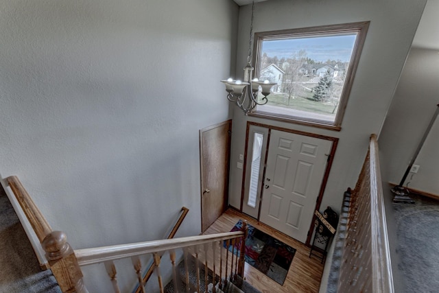 5341 Scrub Oak Cir, Rapid City, SD 57702 - entrance foyer featuring an inviting chandelier