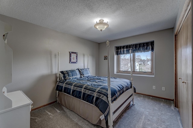 5341 Scrub Oak Cir, Rapid City, SD 57702 - bedroom featuring carpet floors, a textured ceiling, and baseboards