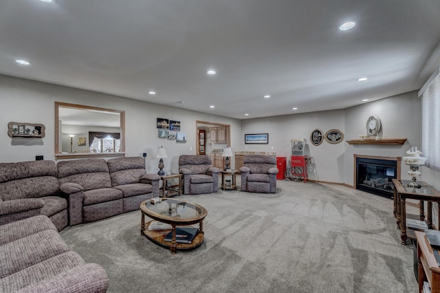 5341 Scrub Oak Cir, Rapid City, SD 57702 - carpeted living room with recessed lighting and a glass covered fireplace
