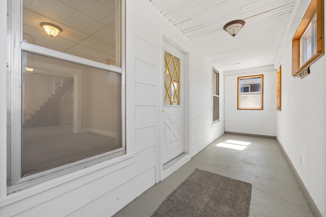 corridor with baseboards