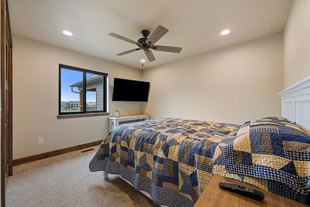 carpeted bedroom with baseboards, recessed lighting, visible vents, and a ceiling fan